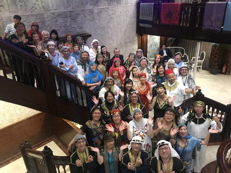 Group of travelers Nile Cruise Egypt wearing Egyptian outfits GoGo Tours