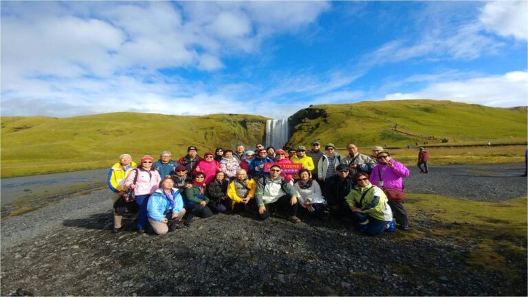 GoGo Tours travelers Skógafoss waterfall Iceland