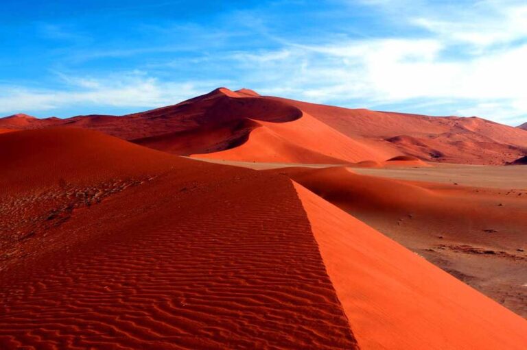 Majestic red sand dunes in Namibia’s Sossusvlei desert, featured in GoGo Tours’ Southern Africa: 3 Countries – South Africa, Botswana & Namibia (14-Day Tour)
