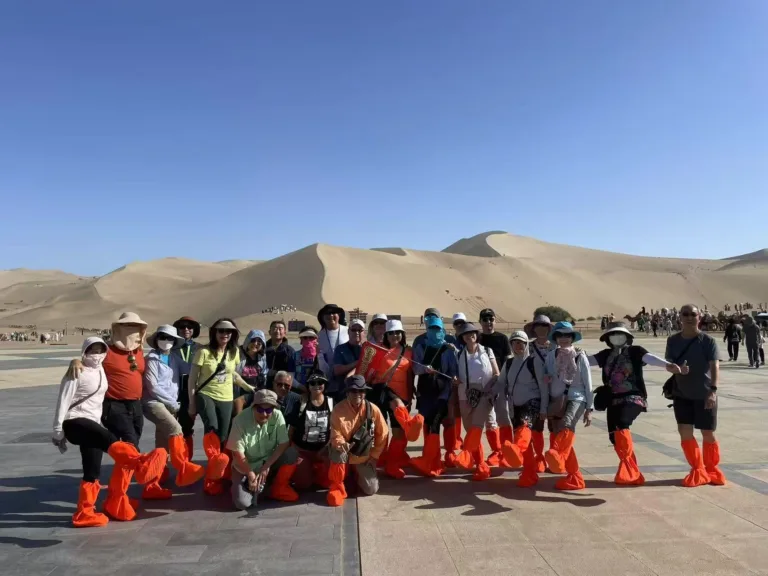 GoGo Tours group photo at Mingsha Sand Dunes