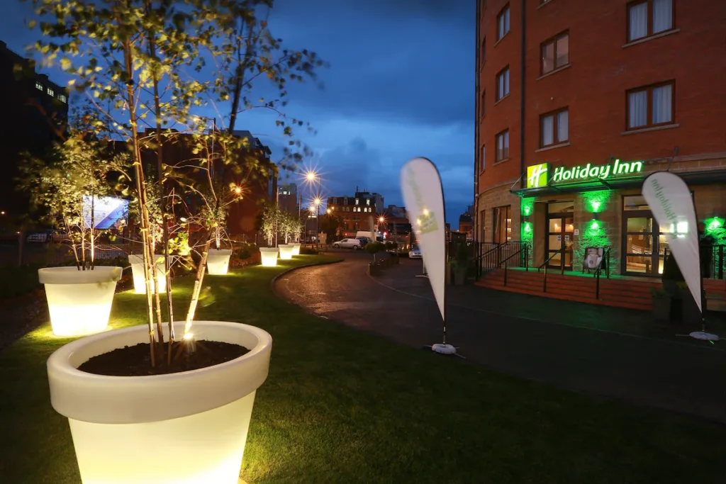 Holiday Inn Belfast City Centre hotel exterior dusk Northern Ireland GoGo Tours