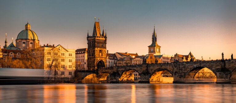 Charles Bridge Vltava River sunset Prague Czech Republic sightseeing tour GoGo Tours