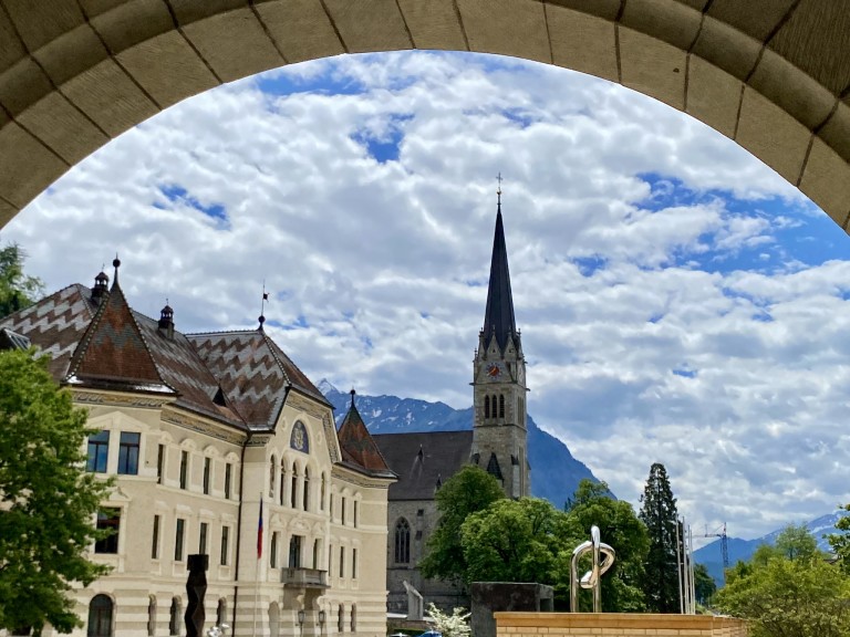 Vaduz cityscape with church and mountains