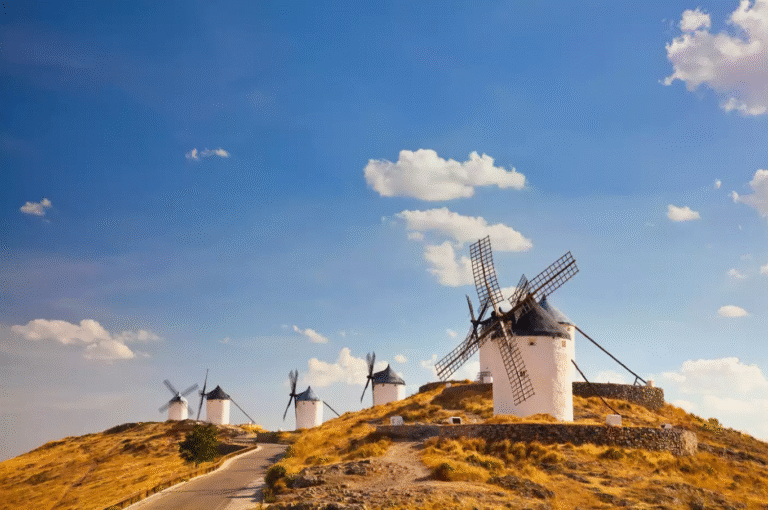 Historic windmills on a hill in Consuegra, Spain.