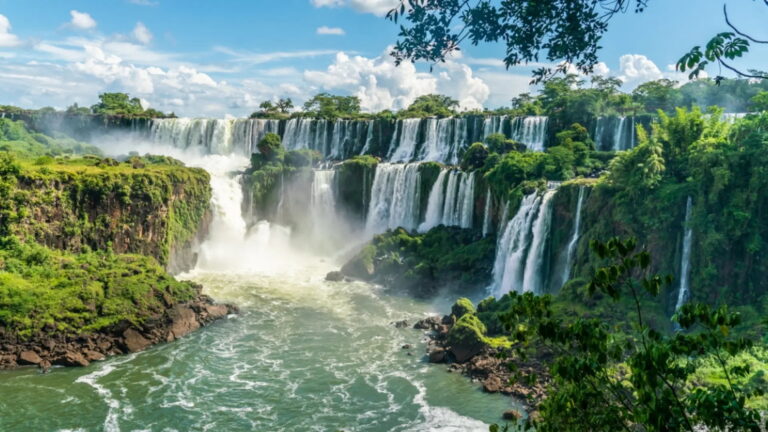 Scenic view of Iguazu Falls with lush greenery